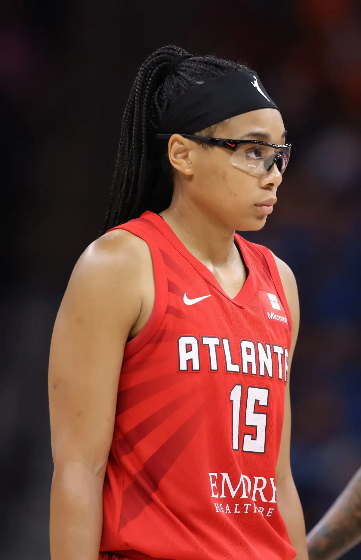 Allisha Gray of the Atlanta Dream in a white jersey holding a basketball