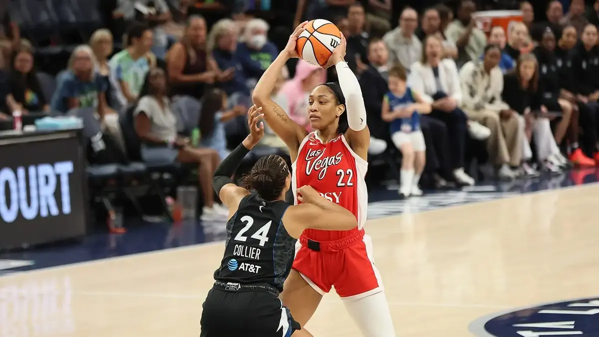 A'ja Wilson of the Las Vegas Aces shooting over a Minnesota Lynx defender
