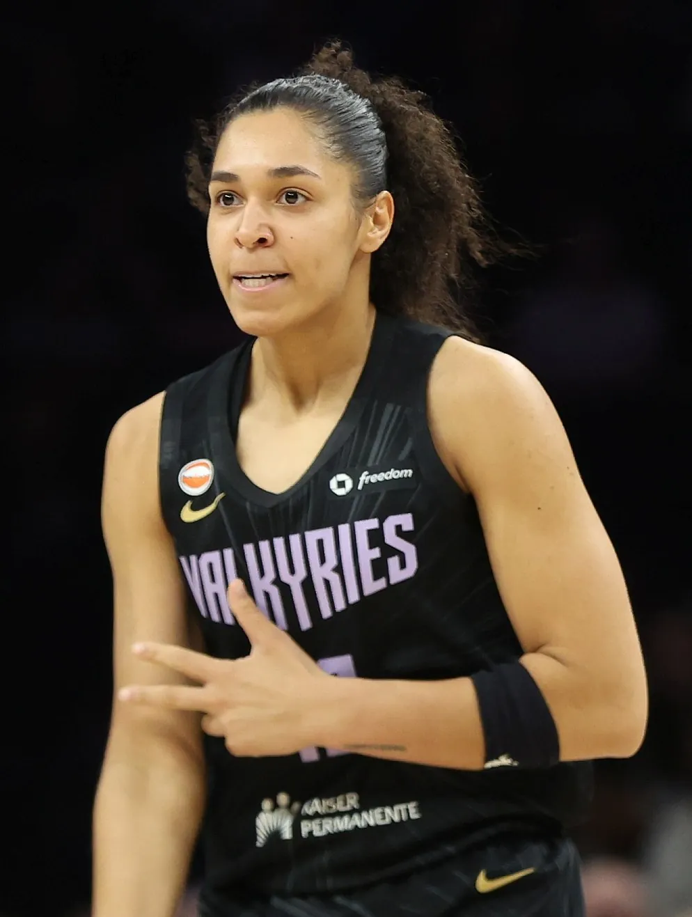 Janelle Salaün of the Golden State Valkyries, in a black Valkyries jersey, at Target Center