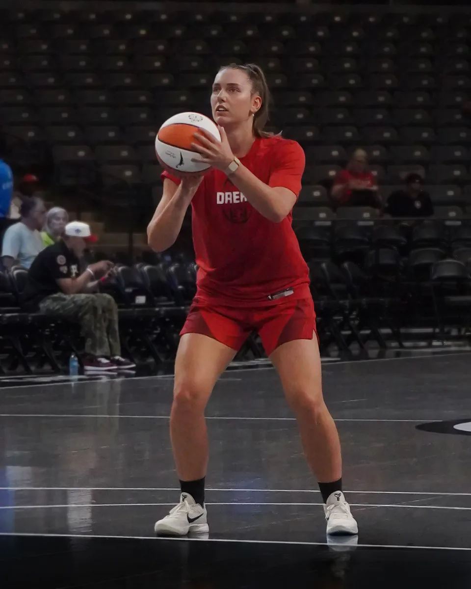 Isobel Borlase of the Atlanta Dream shoots in red warmups at Gateway Center Arena, May 24, 2026